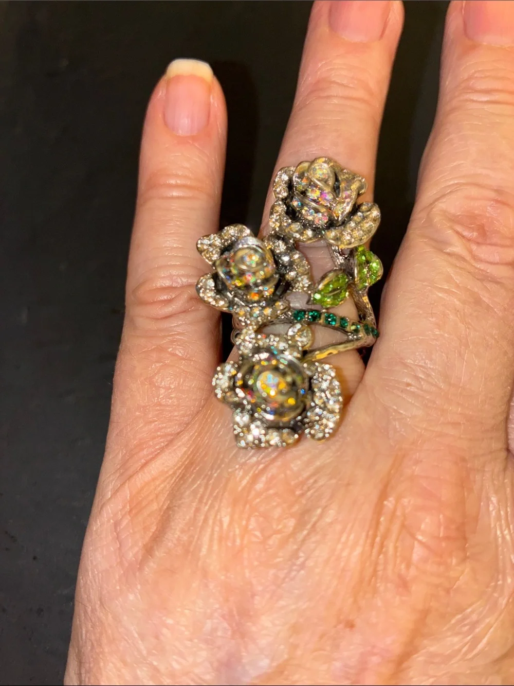 Featuring Three Crystal Rose Blooms Cocktail Stretch Ring with Green Accents